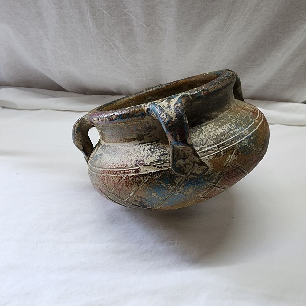 Mexican pottery tilted pot "top like shaped on bottom"  X